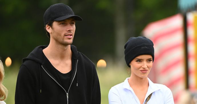 The Traitors Rob Rausch and Maura Higgins address their ‘undeniable chemistry’ and dating rumors during the reunion.