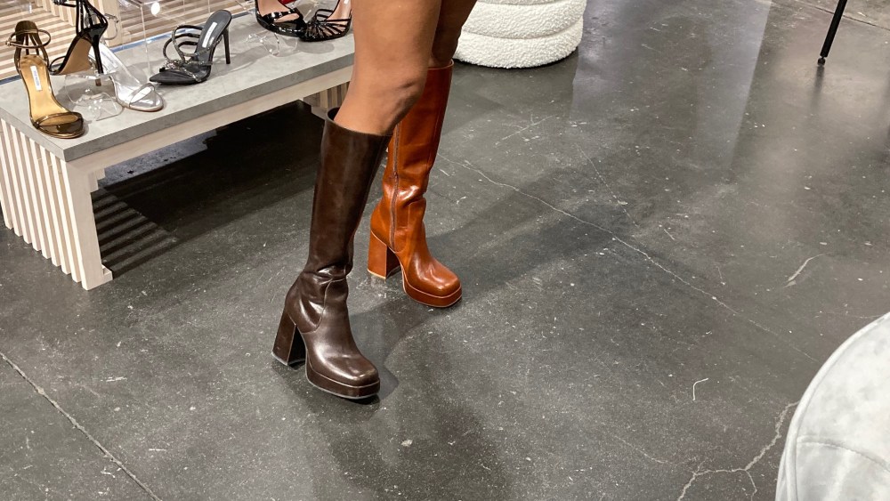 Shoe brands showing at Coterie say tariff uncertainties has made pricing more difficult, as boots remain the dominant focus for Fall/Winter '26.
