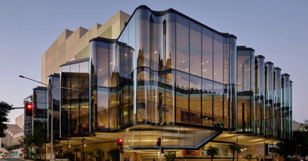 There's a whole giant structure with remarkable details behind the glass, but we're all really here for this building's striking facade, first and foremost. This is the Glasshouse Theatre, the performance venue unveiled last week by the Queensland Performing …