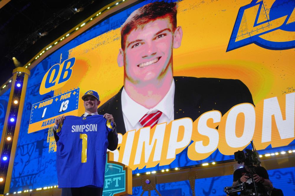The win-now Rams shocked by picking a QB and the Cowboys addressed their disastrous defense as a faster-paced first round reshaped the NFL draft’s opening night