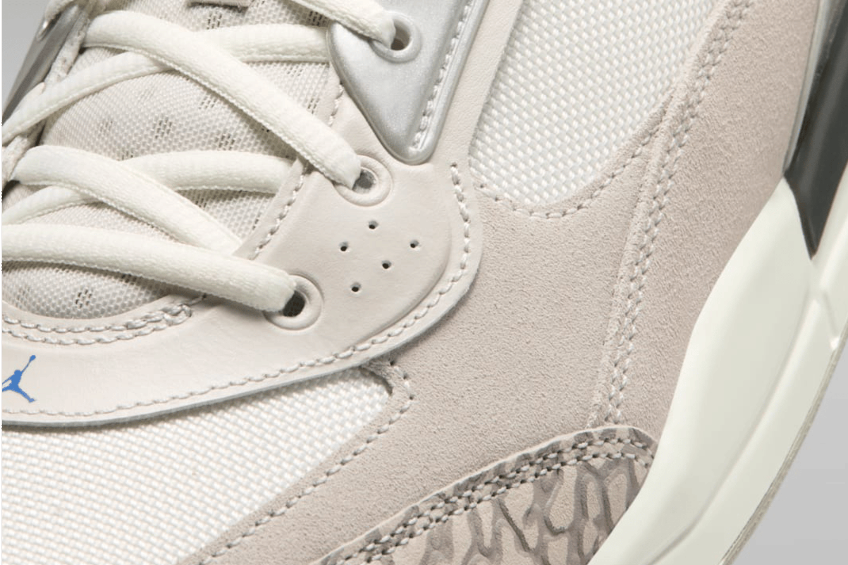 Nike's dad shoe-like Air Jordan Ultra arrives in a clean Sail/Gamma Grey colorway, combining lightweight mesh, elephant print detailing and a visible Air unit.
